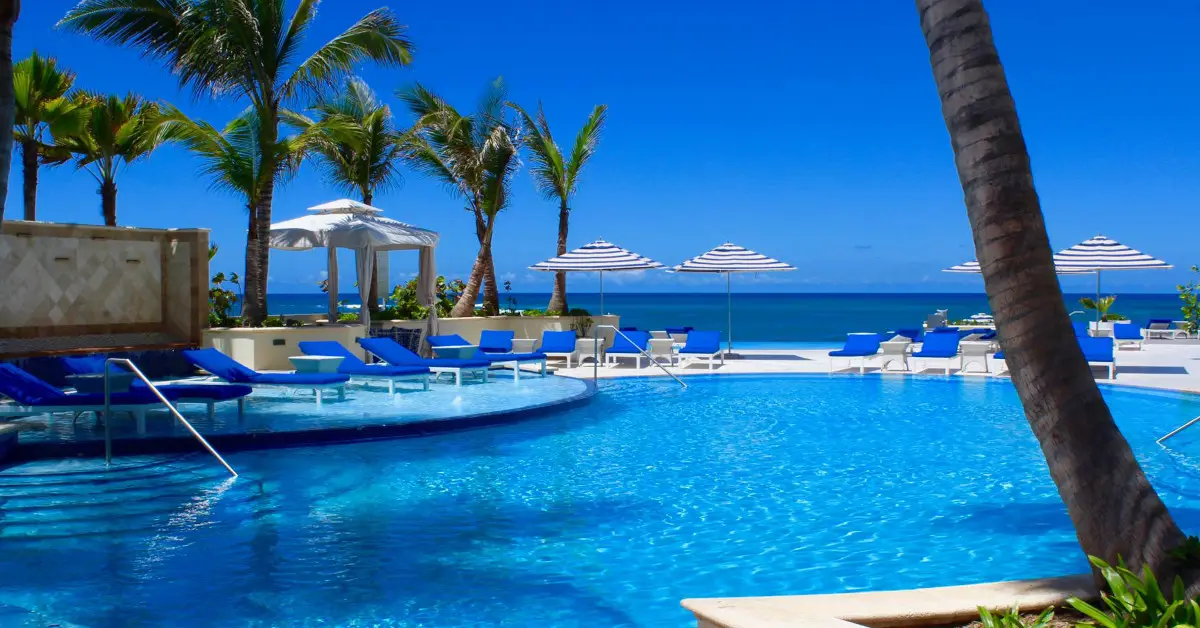 Condado Vanderbilt Hotel pool with stunning ocean view in San Juan, Puerto Rico