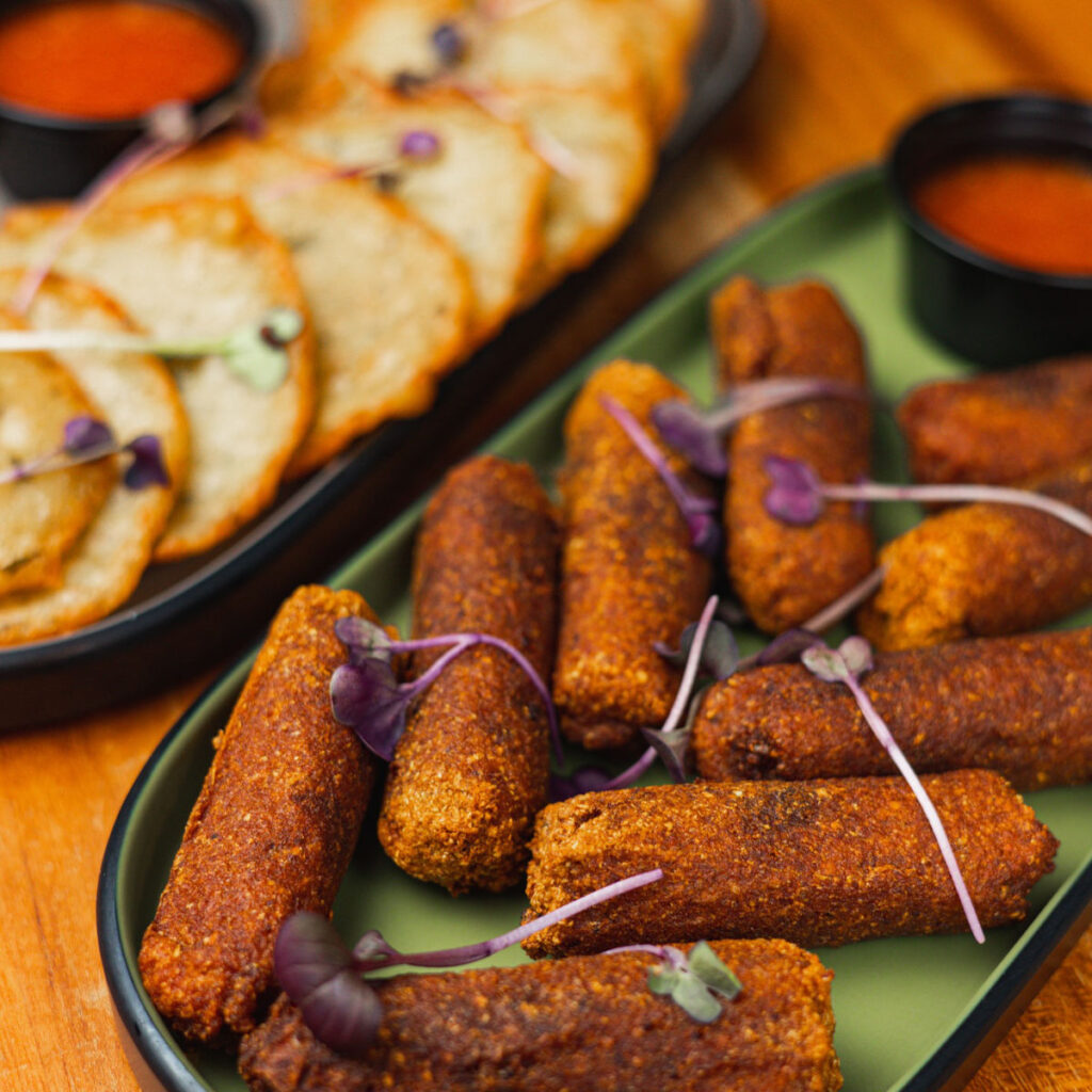 Traditional appertizers: amini Alcapurrias and mini Bacalietos at Raices Old San Juan